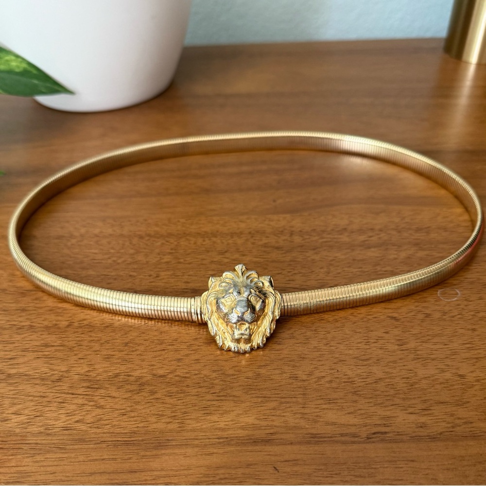 Vintage Accessocraft NYC Gold Metal Lion Head Coil Belt 
Size Small to Medium